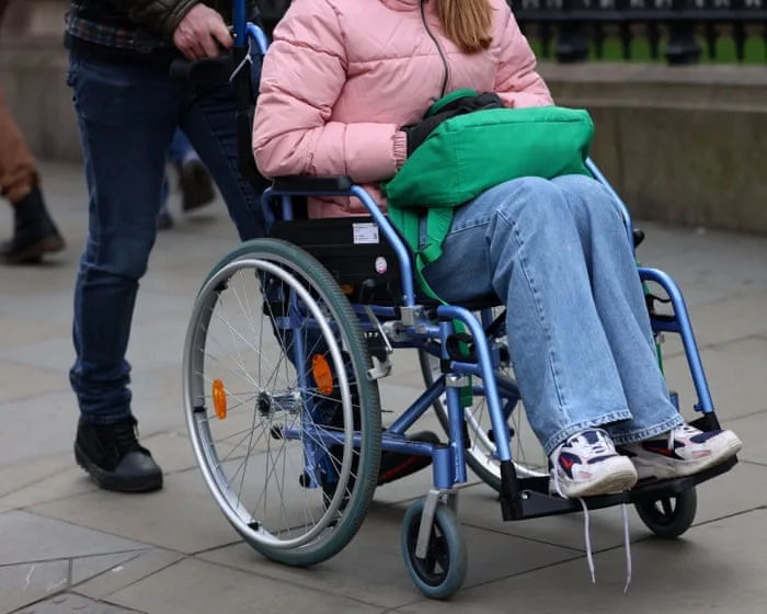Disabled people in UK need right to travel abroad, say MPs, after ‘ridiculous’ restrictions