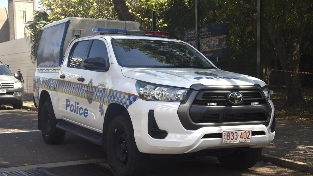 Darwin woman dies, partner arrested over alleged DV order breach