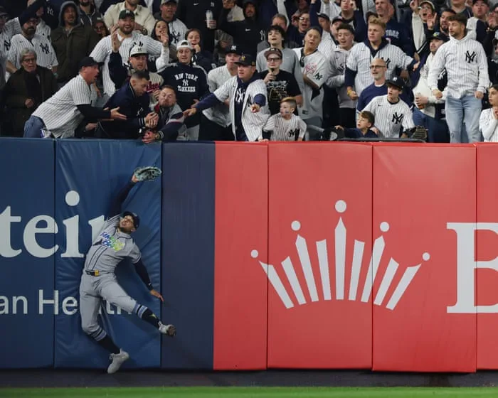 Rays sweep Yankees out of playoffs after ‘crazy’ fan interference downgrades New York home run