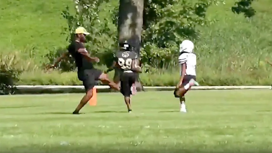 Wisconsin parent storms field during youth football game and trips 9-year-old kid in wild scene