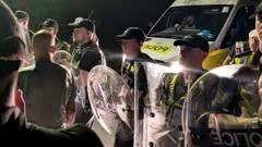 Protesters block roads in Portsmouth after 140 migrants arrive in boat