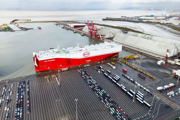 Huge shipping container carrying 7,000 electric cars docks in UK as vehicles take over town