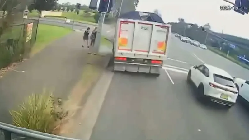 Heart stopping moment truckie ‘almost hit two school girls’