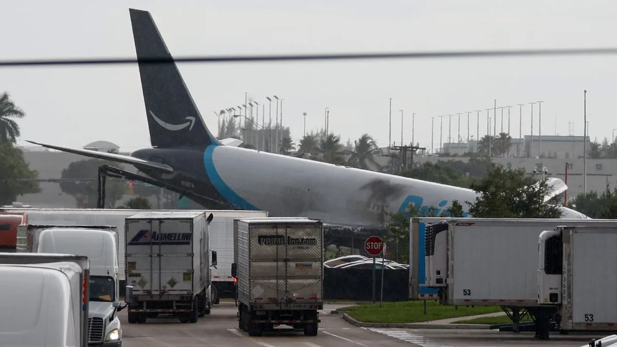 At least 5 dead after Amazon cargo plane barrels off Miami runway and smashes into cars: police