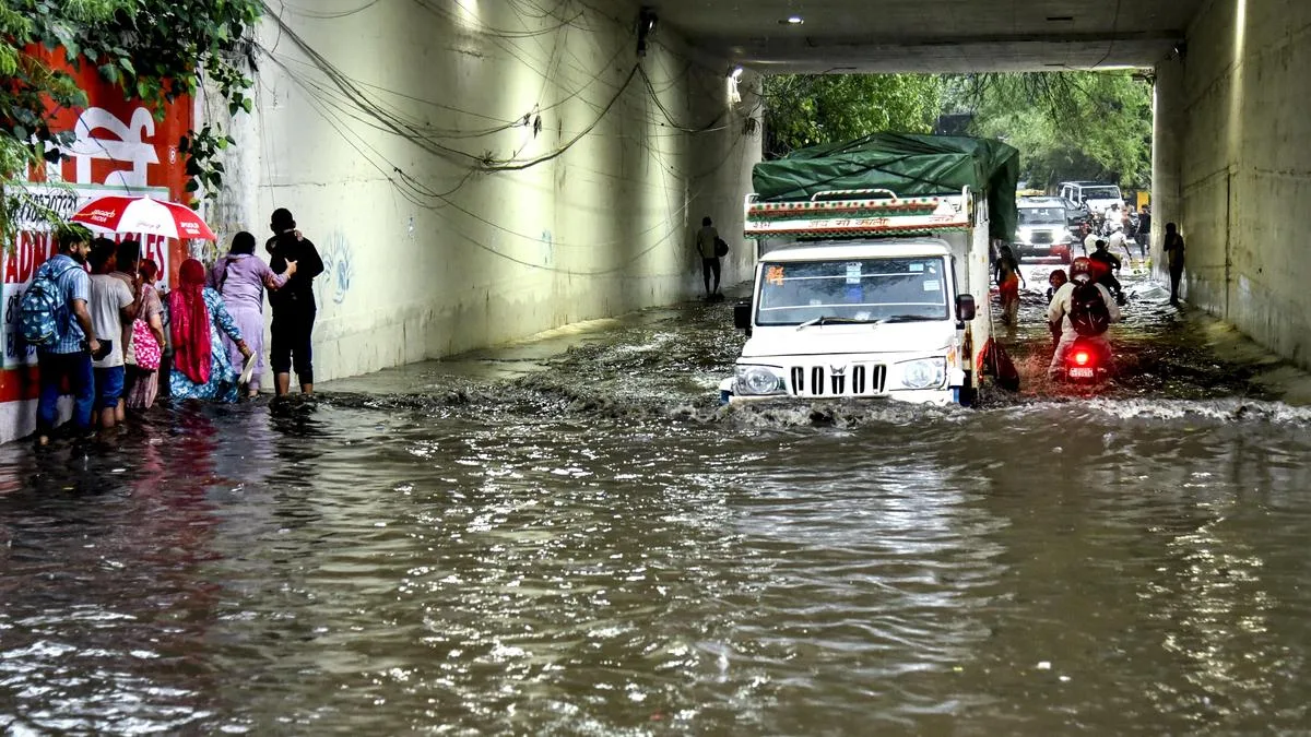Heavy rain lashed several parts of Delhi; portion of building under construction collapses