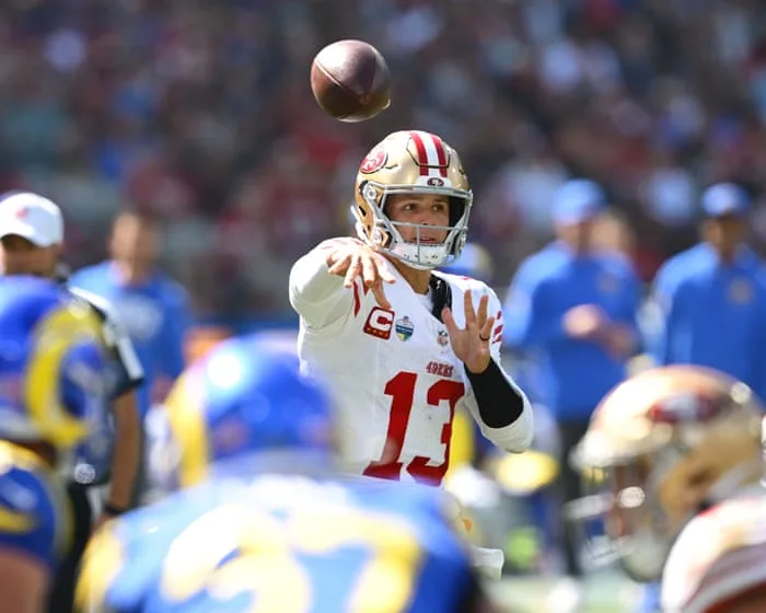 49ers rout Rams behind Purdy’s three TDs as NFL draws 100,000 to Melbourne