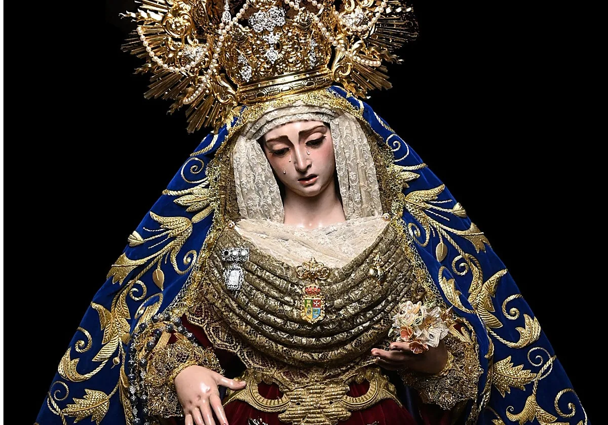 La Virgen de los Dolores de San Juan de Aznalfarache sale en rosario con la banda del Maestro Tejera