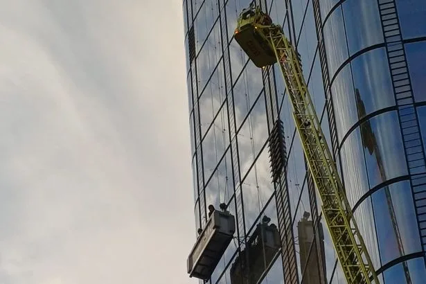 Window cleaners rescued after getting stuck at 15th floor of London skyscraper
