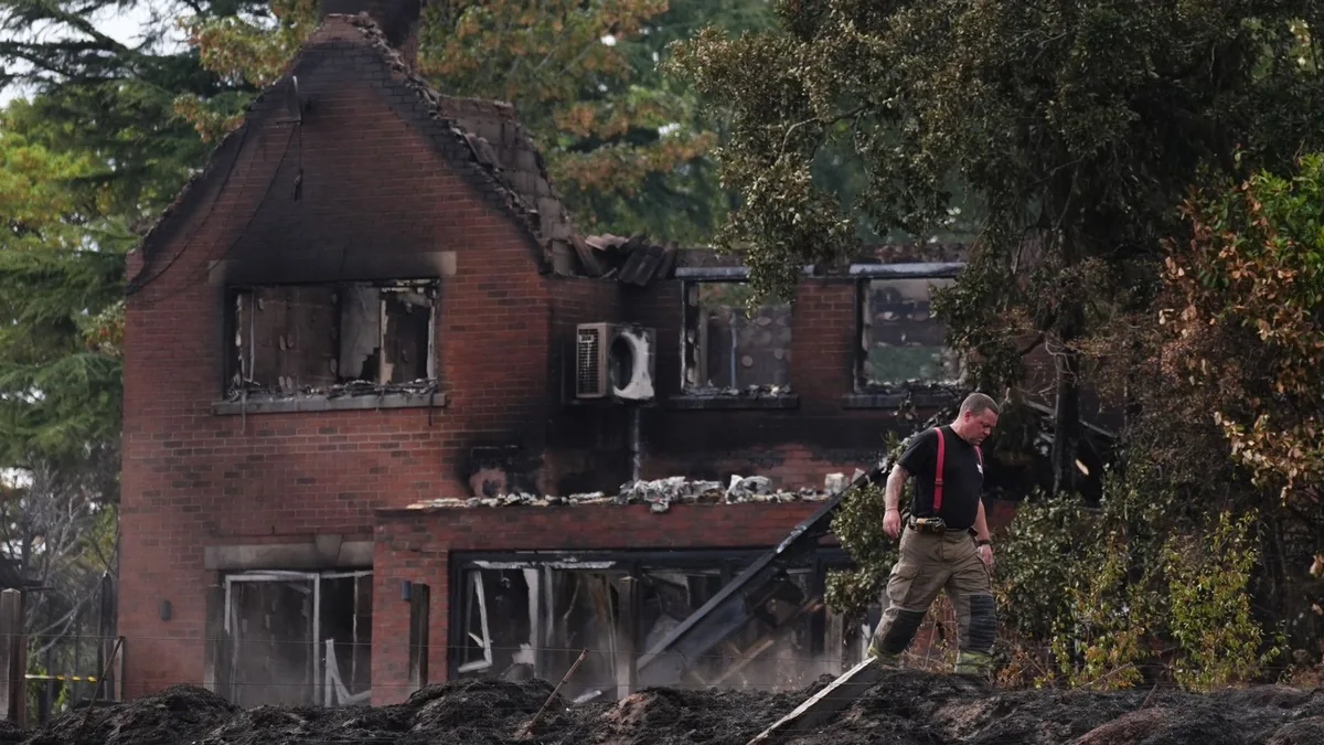 Two fires which destroyed 19 homes in Stourbridge were started accidentally