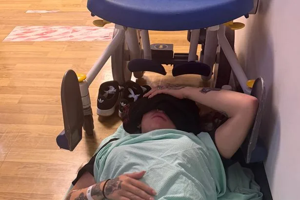 Woman 'left lying on hospital floor under wheelchair for seven hours crying in pain'
