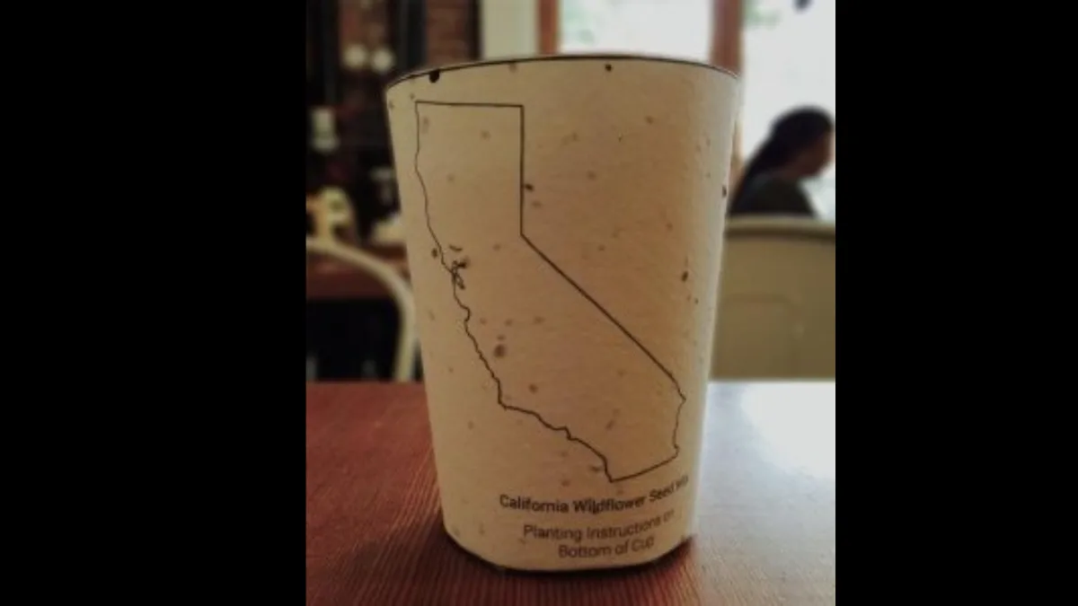 This coffee cup hid seeds in its paper; plant it after your last sip