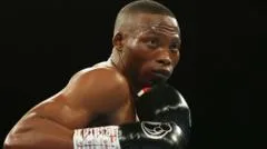 Four arrested over boxing champion's murder in South Africa
