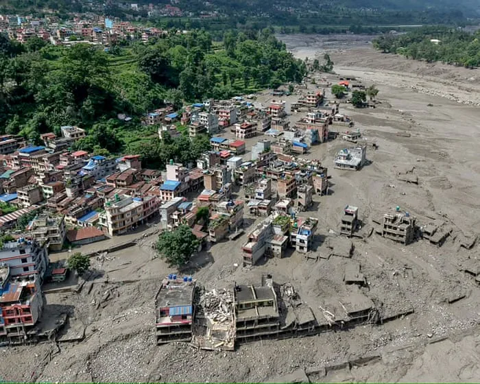 At least 12 Britons among hundreds of tourists and locals missing in flash flood on Nepal-Tibet border – latest updates