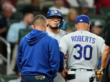 Dodgers hold out Miguel Rojas due to sore back. Ronald Acuña Jr. is starting in RF for Braves