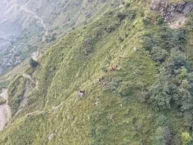 Rescue helicopters race to flood-hit Nepal villages as 5 reported missing