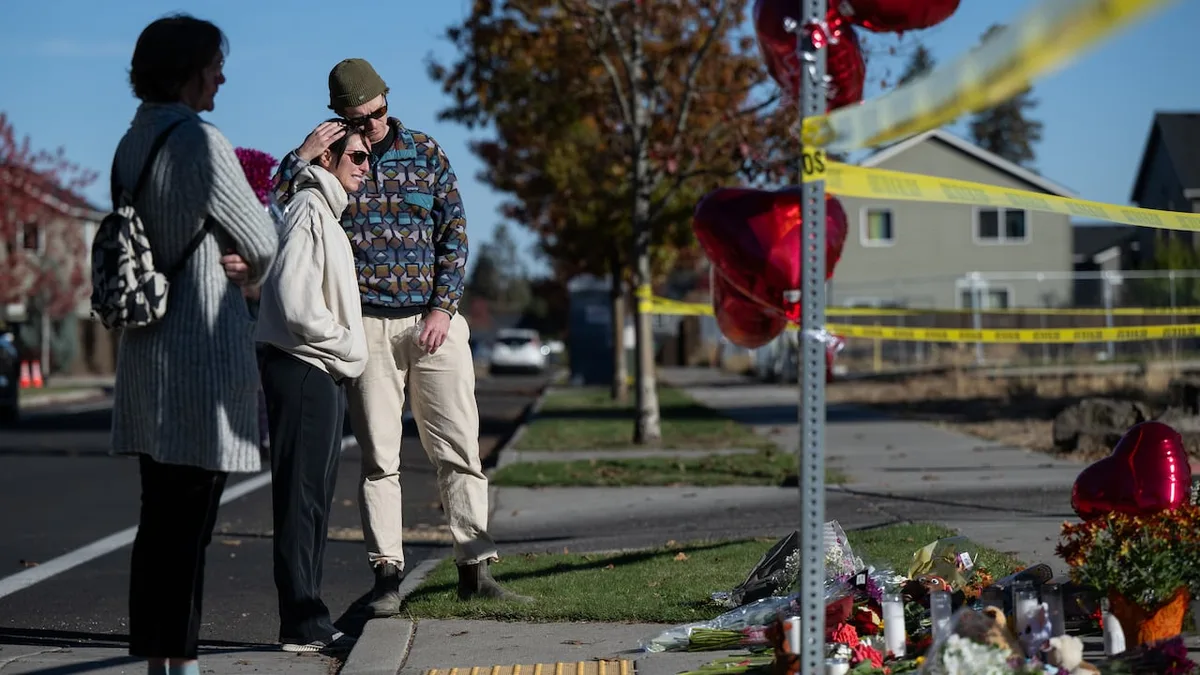 Teacher threw cellphone, tackled shooter who killed 4 at Oregon school, police say