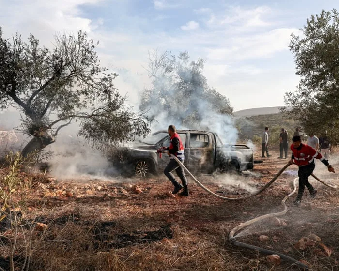 Israeli settlers attack olive farmers and Washington Post journalist in West Bank