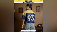 Oxford apologise for United 93 shirt advert