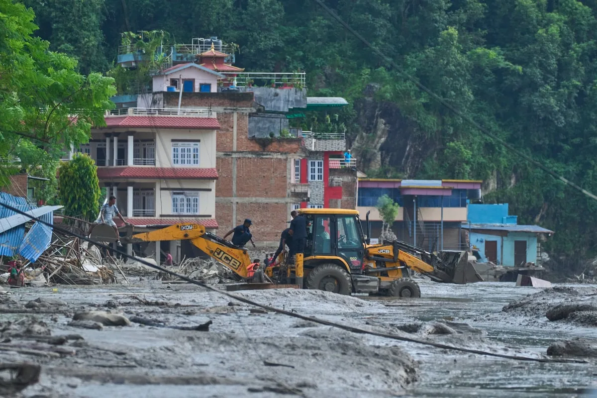 Rescuers search for dozens of Britons among those missing in Nepal after floods