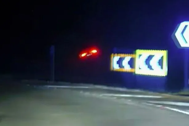 Shocking moment criminal hits stolen car on kerb and flies into air during 100mph police chase