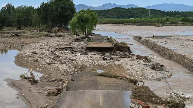 Número de mortos em inundações na região de Guangxi aumenta para 159