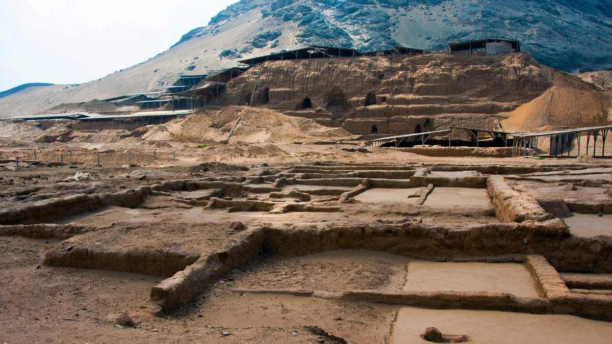 1,500-year-old child burial unearthed in Peru with whistles, rattle and vessel
