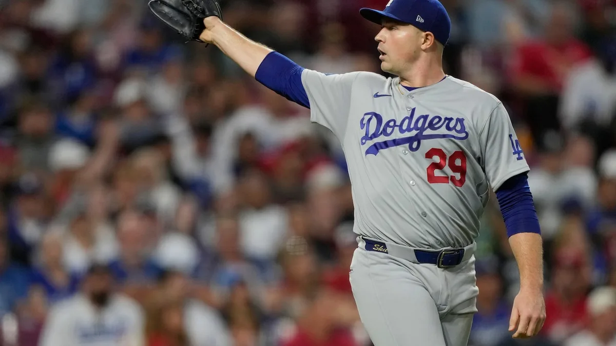 A quiet toast as the Dodgers clinch record-tying 14th straight playoff spot