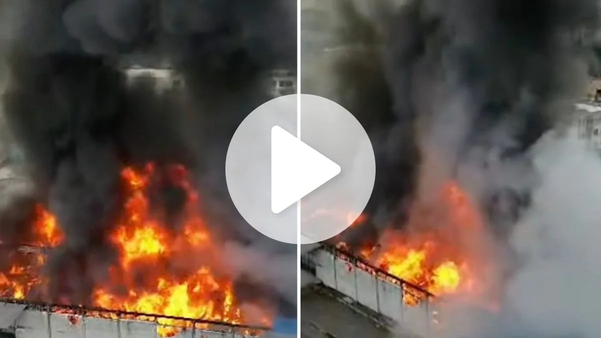 Incêndio de grandes proporções atinge galpão e evacua prédio residencial em cidade da Grande Florianópolis