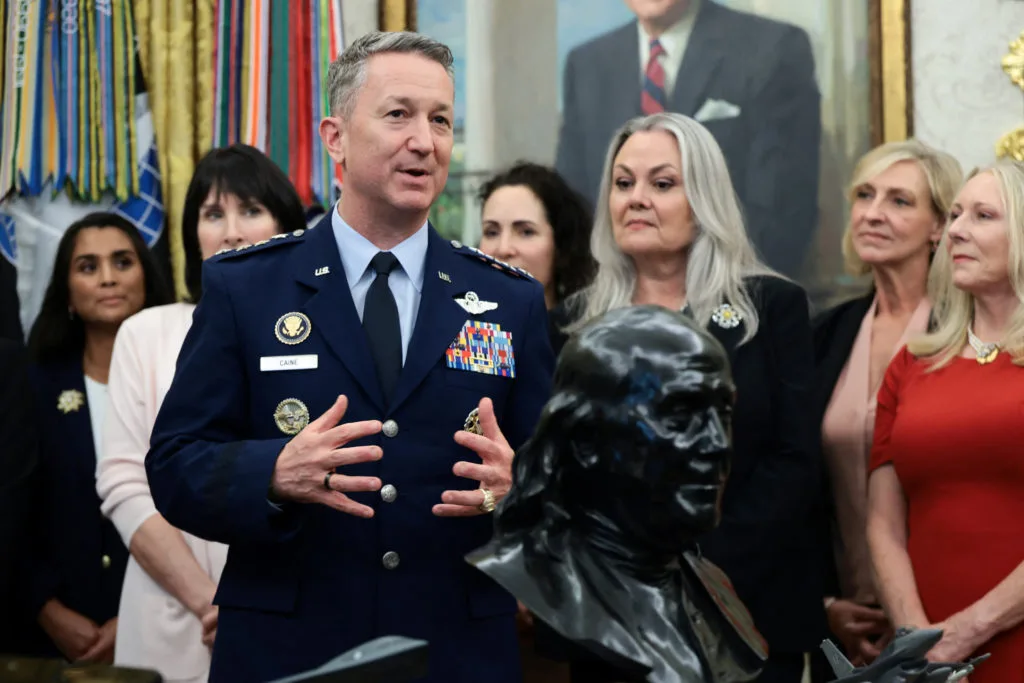 U.S. has no plans to send troops to the polls in November, Gen. Caine says