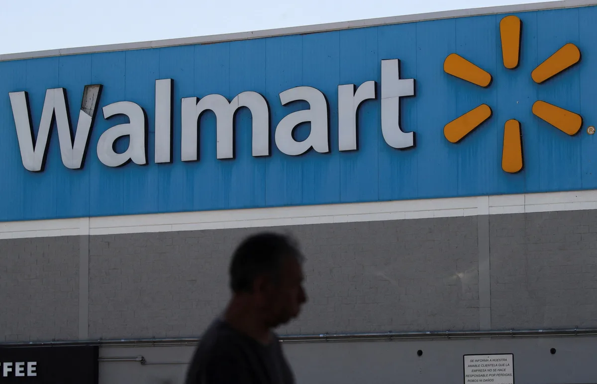 Walmart reports rare sales miss as consumers cut spending, shares fall