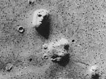 Mysterious structures spotted in NASA Mars images fuel claims of ancient city on the Red Planet