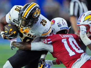 Woodyard's 2 second-half takeaways swing Border War as No. 23 Missouri beats Kansas 38-21