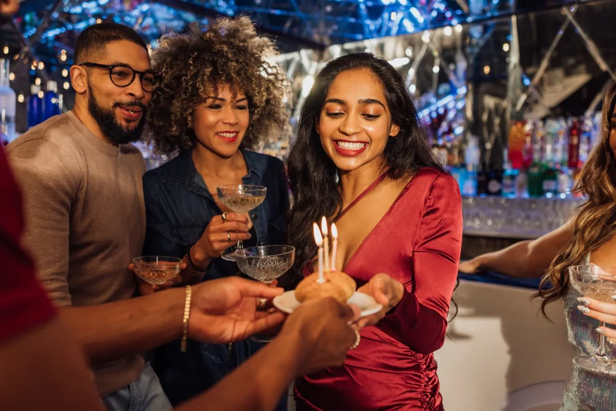 My friend is charging everyone $80 to attend her 30th birthday party. She says it’s to cover the open bar. Is it rude to not go?