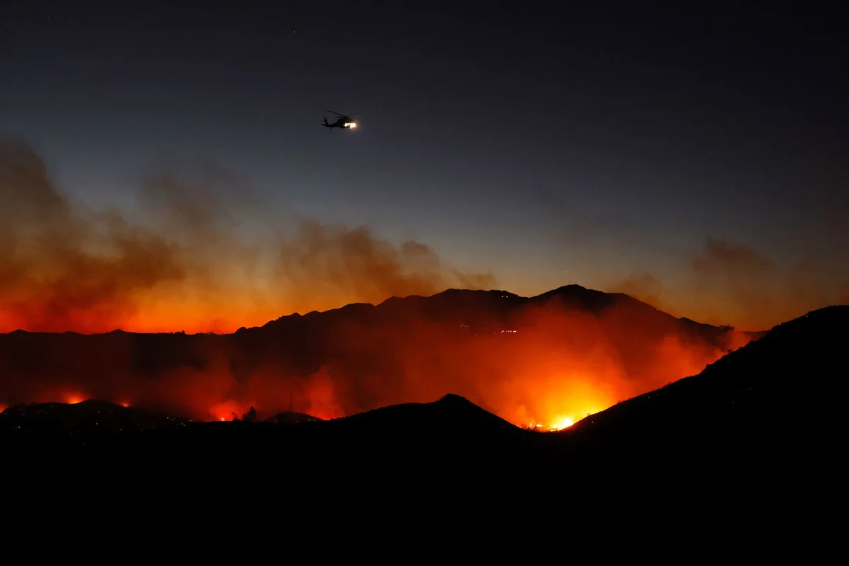 Malibu wildfire rages, triggering evacuations in Southern California