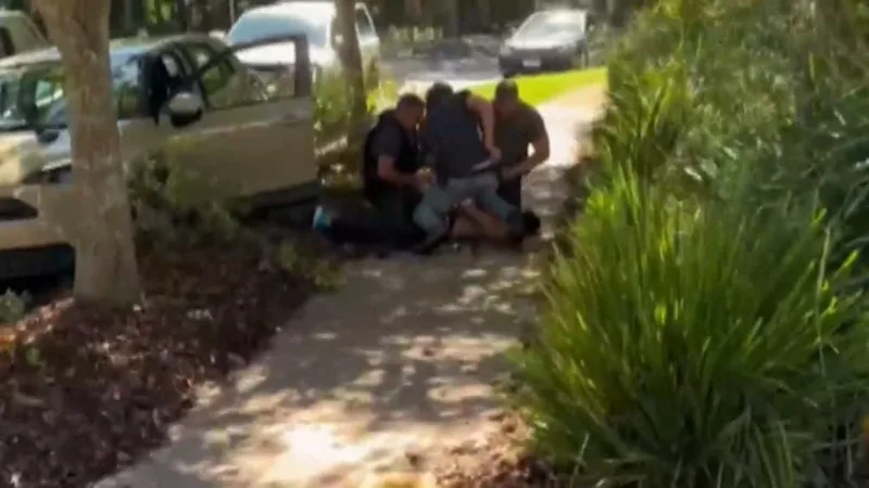 Two men charged over police chase