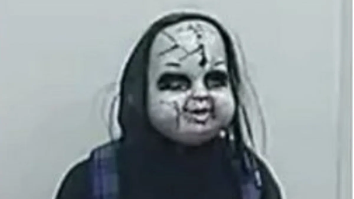 Hunt for 'Chucky-style' masked man who chased woman
