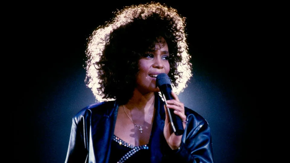 Whitney Houston Soars Back Onto The Charts After Dolly Parton’s Passing