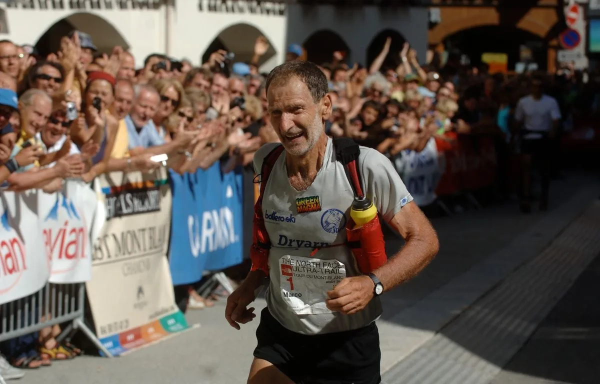 UTMB 2026 : Comment Marco Olmo régnait sur l’ultra-trail mondial à 58 ans, avec son collant fuchsia « légendaire »