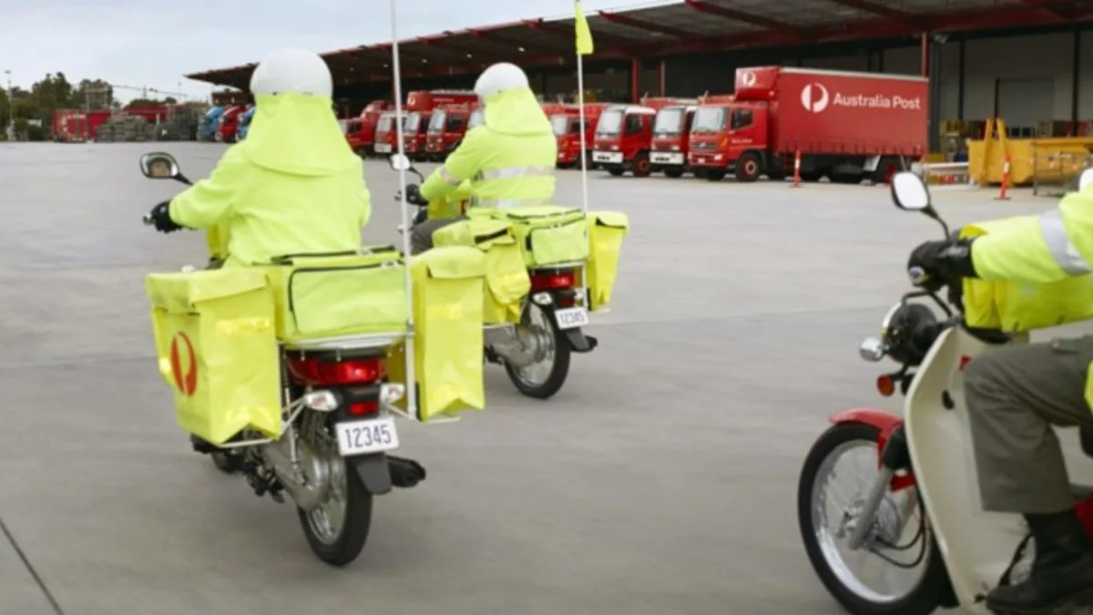 Australia Post flags fewer letter deliveries as mail volumes plunge and parcels boom