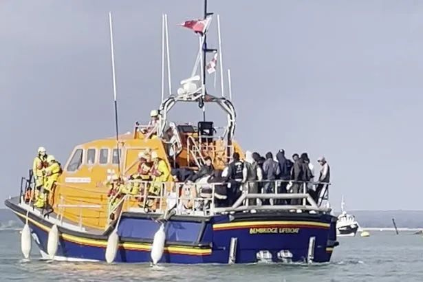 RNLI warned of cyber attack after volunteers abused for saving migrants by far-right thugs