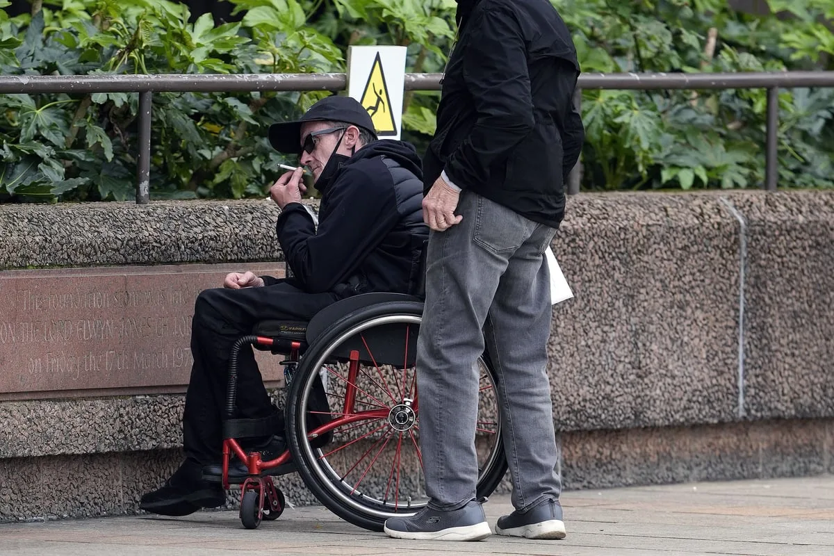 Liverpool fan accused of racial abuse taken to hospital during trial