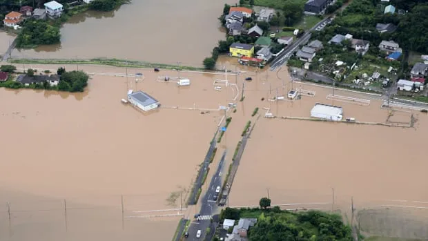 Record rainfall in Japan leaves at least 8 dead, strands travellers