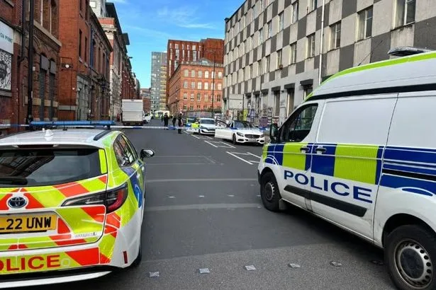 Counter-terrorism police swarm Manchester city centre with two arrested and cordon in place
