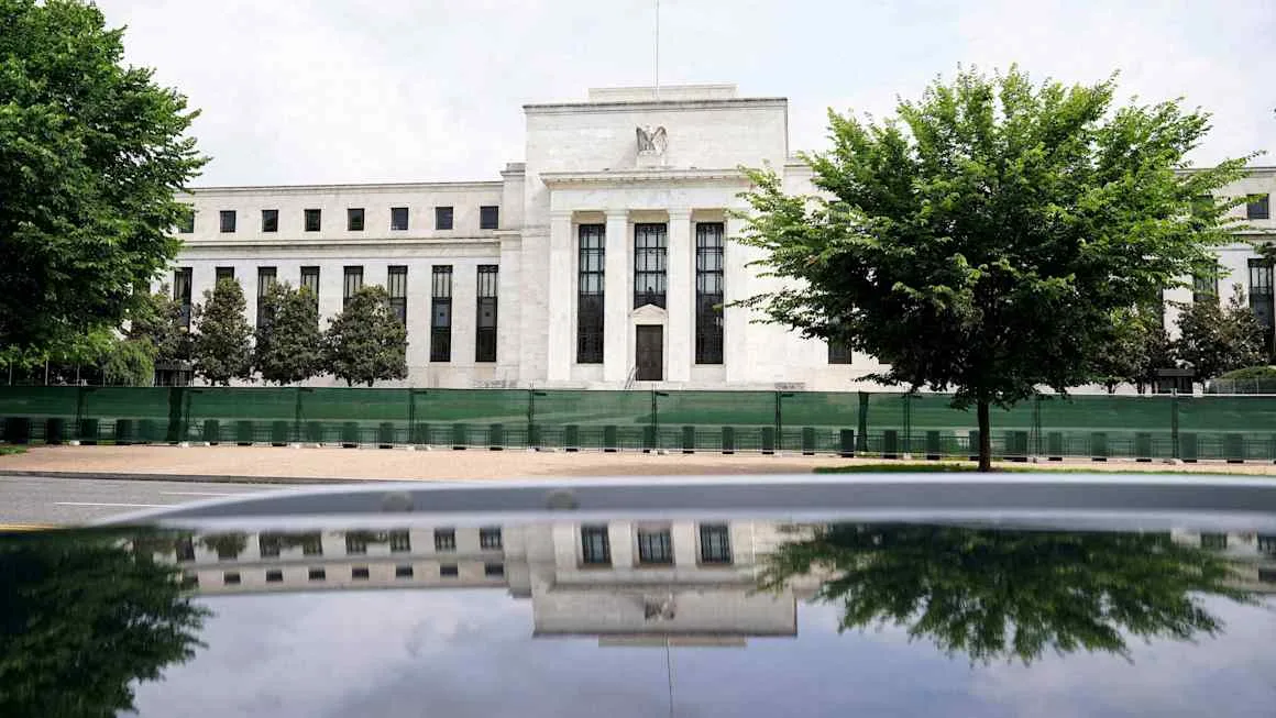 Fed should defy Trump with rate rise, top economists say
