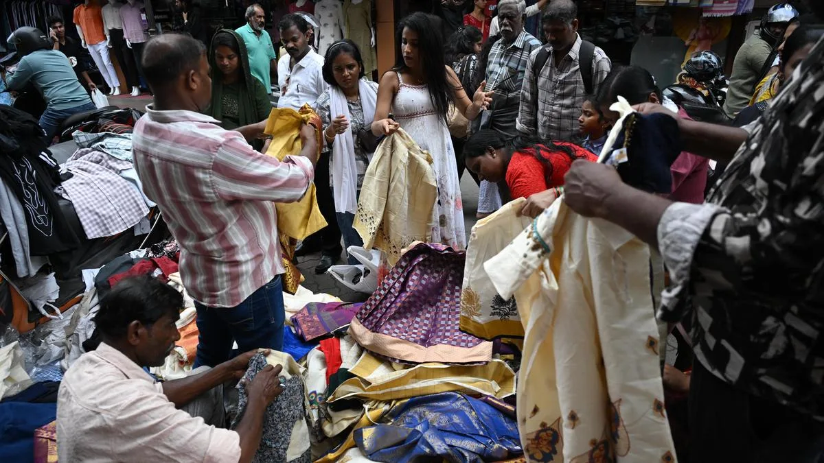Broadway bustles with Onam shoppers, but rain dampens cheer