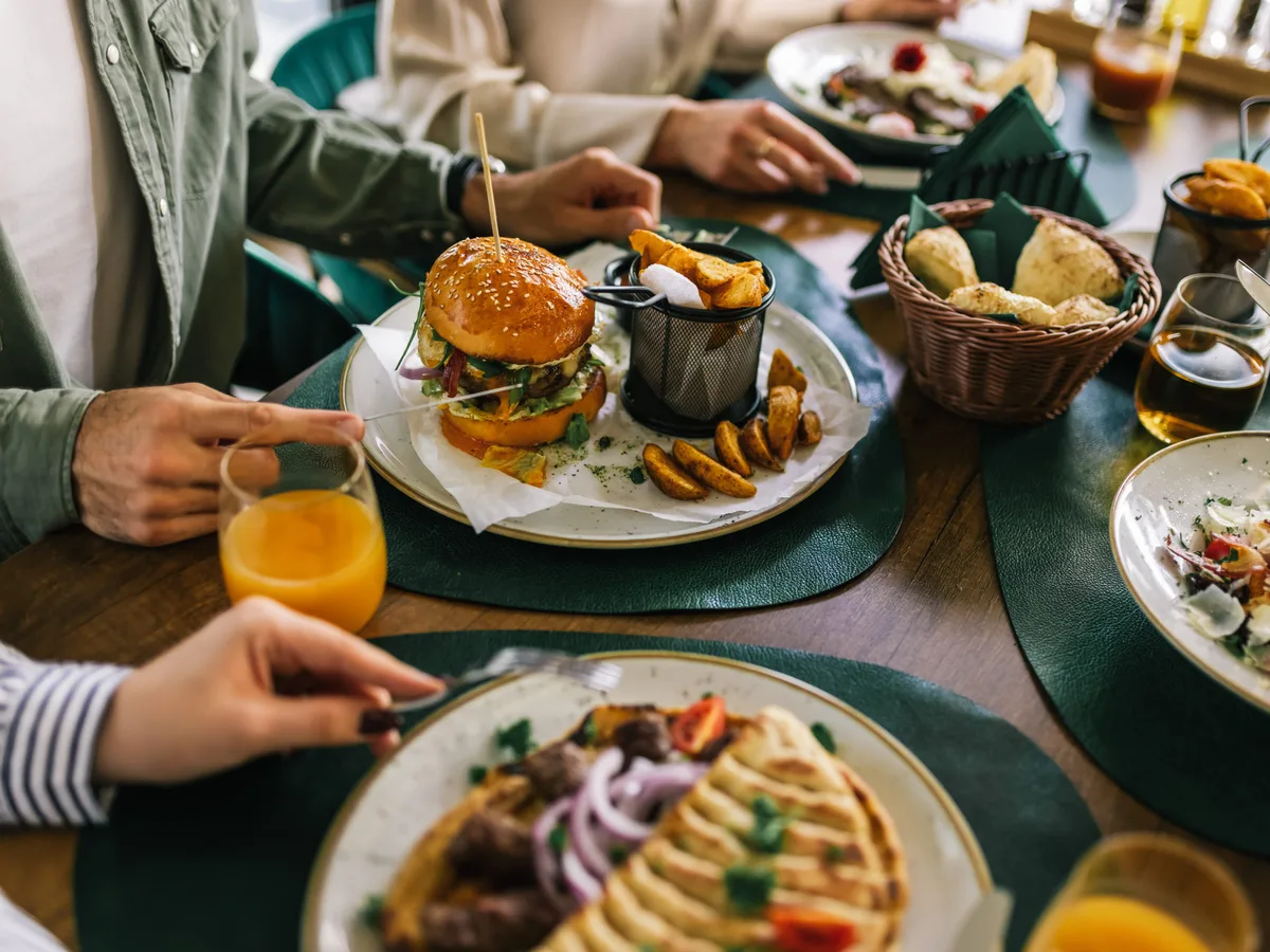 4 things you should never order in front of your boss or coworkers, according to an etiquette expert