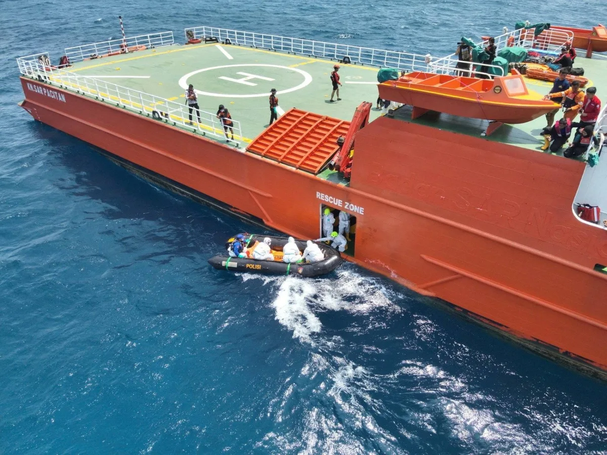 Death toll from capsized ship in Indonesia rises to 26 as search continues for 109 missing passengers