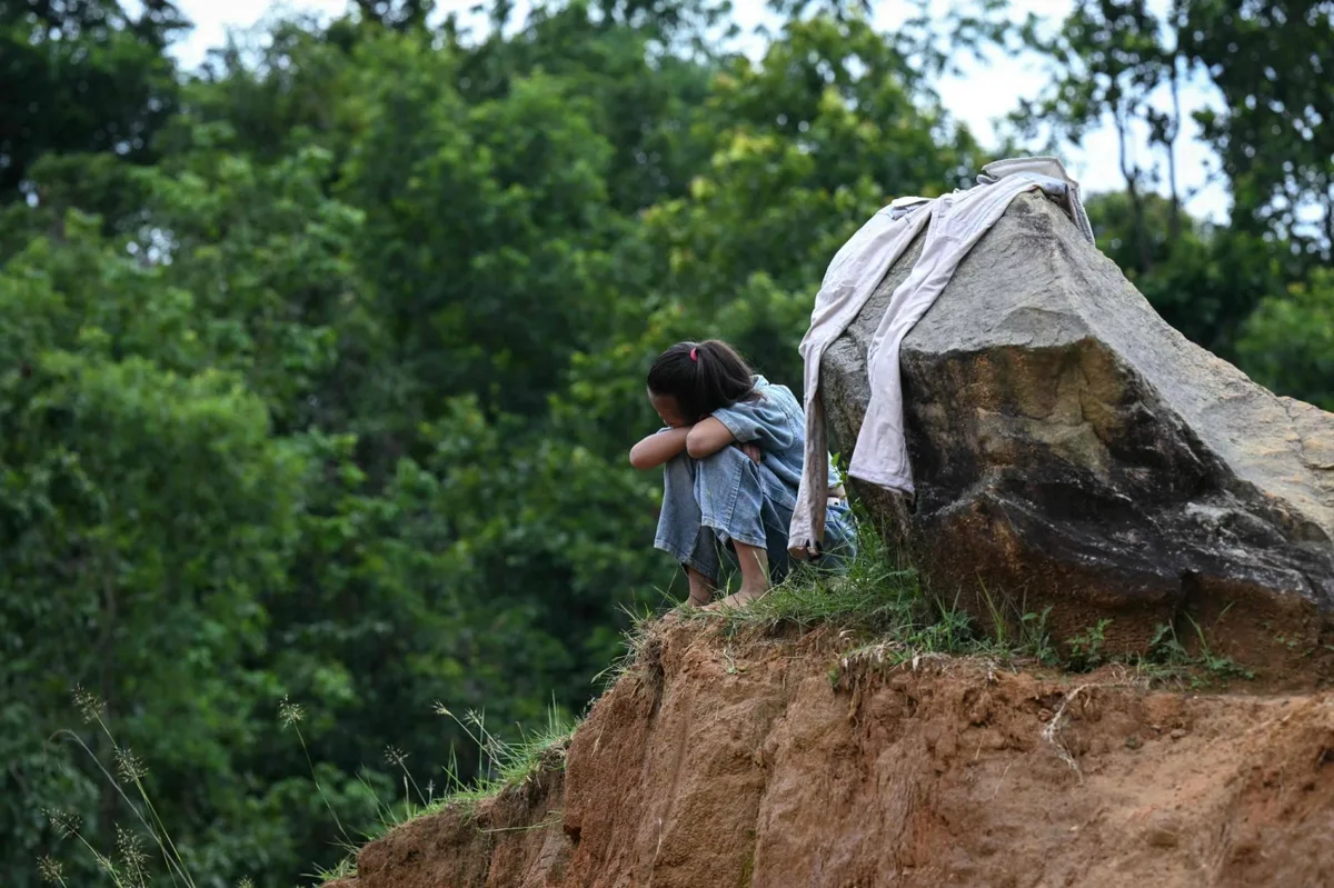 Children in flood-hit Nepal grapple with loss and cling to hope
