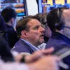 Wall Street no vermelho após subida de taxas de juro da Fed. Dow Jones caiu mais de 1%