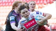 Wigan score 11 tries in victory against St Helens